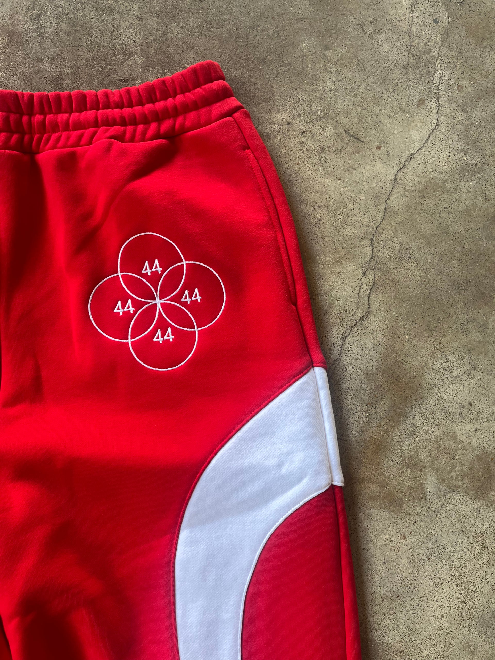 “CYCLES” EMBROIDERED SWEATPANTS - RED