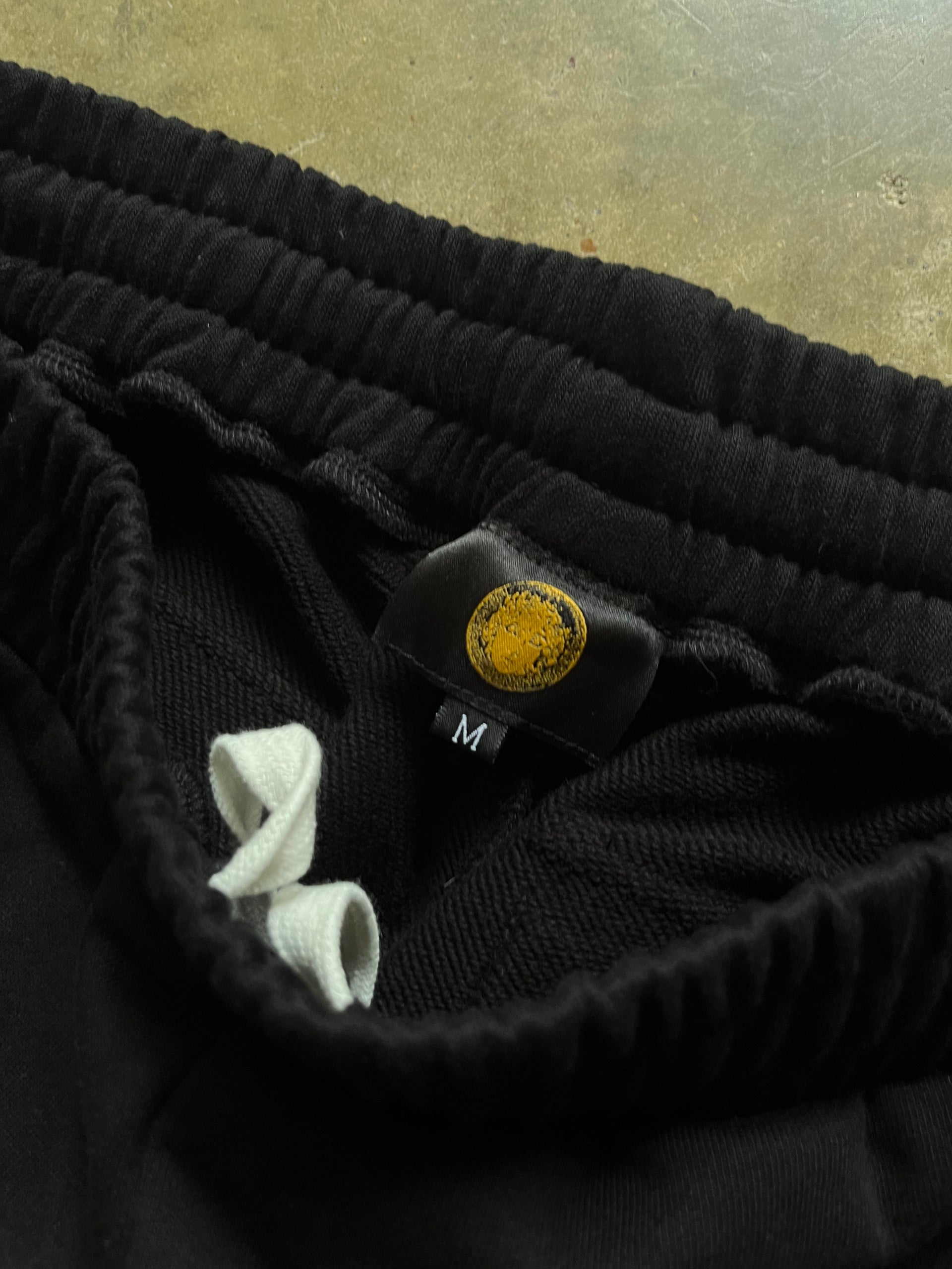 “CYCLES” EMBROIDERED SWEATPANTS - BLACK